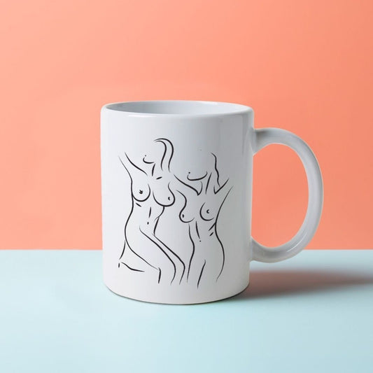 A white mug with a black line drawing of artistic, nude women's bodies.